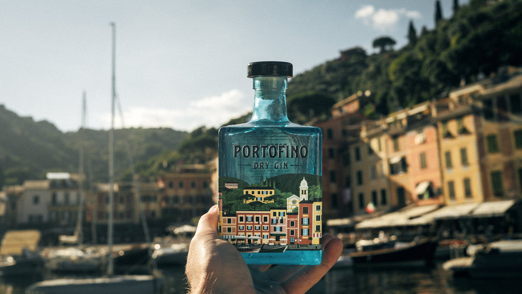 Portofino Dry Gin perfect best gin in italy hand holding up bottle in riviera